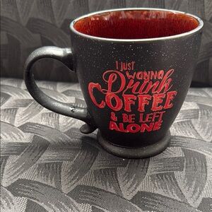 Black Coffee Mug with Red Interior and Text